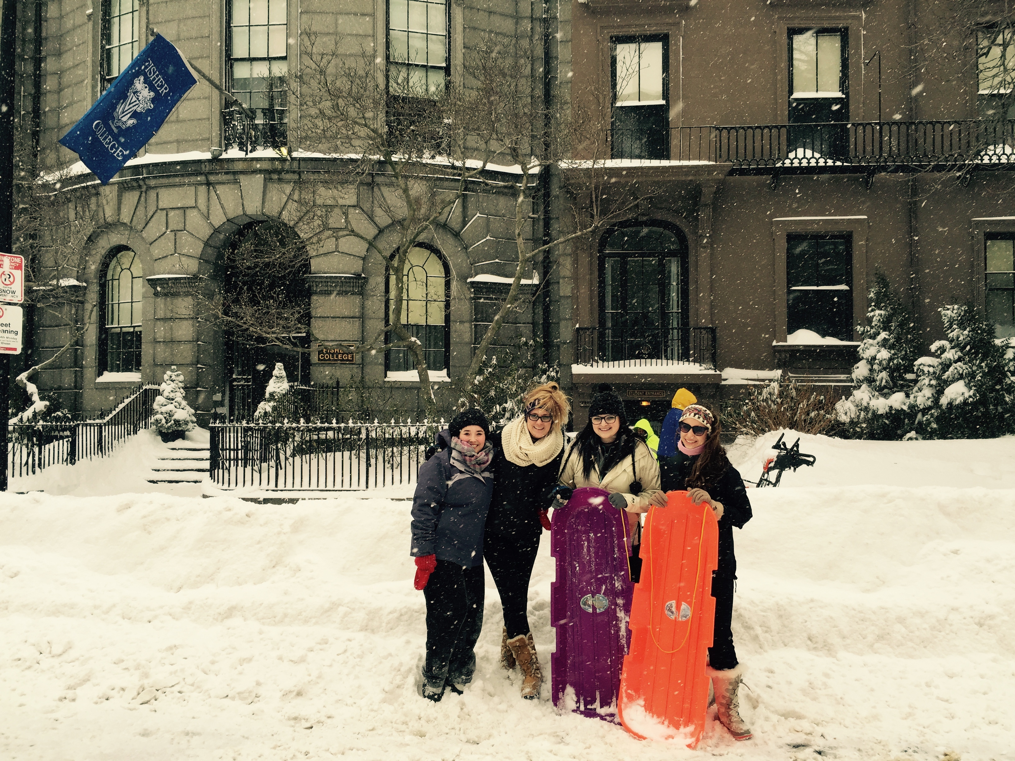 Students in Snow outside Fisher College